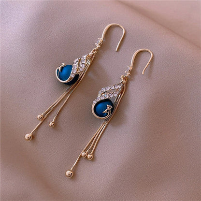 PENDIENTES PEACOCK